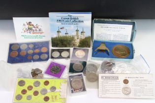 A Small Collection Of Mixed Coins To Include British And American Uncirculated Coin Sets And A
