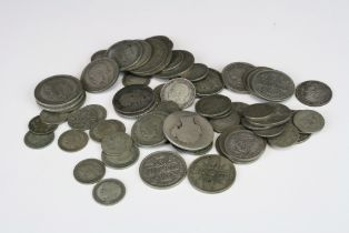 A collection of British pre decimal silver coins to include Half Crowns, Florins, Shillings &