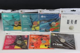 A collection of seven Royal Mint uncirculated £2 coin collectors packs to include A Time to Reflect,