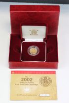 A British Queen Elizabeth II 2002 United Kingdom gold proof half sovereign coin, complete with
