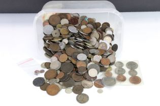 A large collection of British pre decimal and World coins to include many silver examples to include