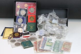 A collection of mainly British pre decimal coins and banknotes to include some silver examples