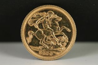 A British Queen Elizabeth II 2000 gold half sovereign coin.