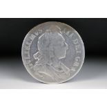 A British King William III early milled 1696 silver full crown coin.