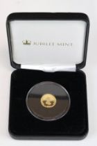 A Jubilee Mint 9ct gold uncirculated St. George & The Dragon proof like coin, encapsulated and