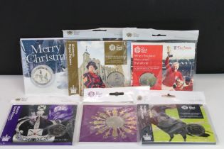 A collection of Royal Mint £5 / Crown coin sets to include The Tower of London, Nutcracker and