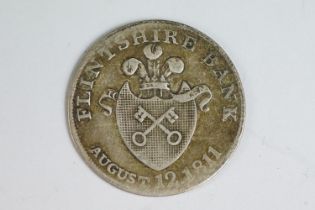 A British Flintshire Bank August 12th 1811 silver one shilling bank token.