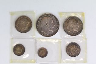 A collection of six British King Edward VII 1902 silver coins to include Crown, Half Crown,