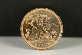 A British Queen Elizabeth II 2001 gold half sovereign coin.