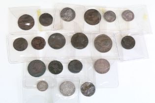 A collection of nineteen King George II early milled silver and copper coins to include sixpence,