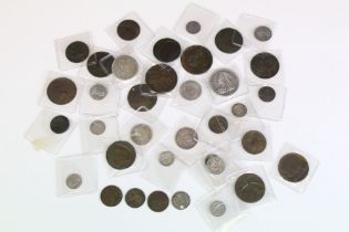 A collection of British Queen Victoria silver and copper coins to include half crown, florin,