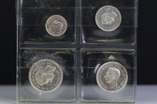 A British King George VI 1951 silver four coin Maundy Set.