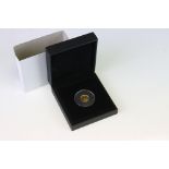 A Queen Elizabeth II 2014 fine gold 1/10 oz Angel coin, encapsulated and within fitted display case.