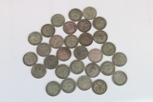 A collection of thirty British pre decimal silver Half Crown coins to include pre 1947 and pre