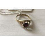 9ct gold antique ring with claw set garnet, size S 2 grams