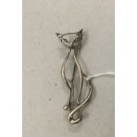 Silver brooch modelled as a cat