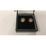 Vintage pair of 9ct gold un-worn earrings set with pearls