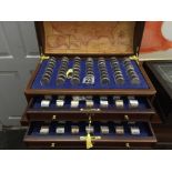 Full set of Danbury Mint United States Quarters, each one un-circulated, 672 coins in presentation