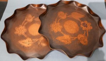 Two Art Nouveau period Cornish art ccircular copper trays with fruit and flower repousee design, J &