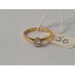 A 18CT GOLD AND PLATINUM SOLITAIRE DIAMOND RING CENTRAL STONE 5MM SIZE Q 2 GMS