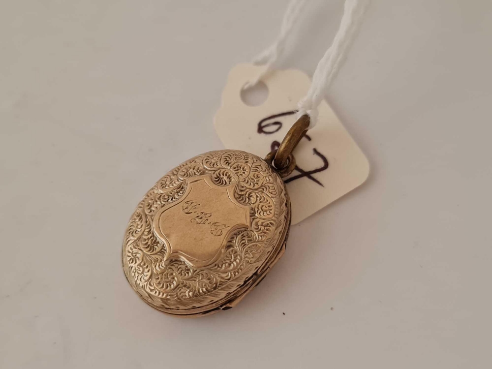 A gold back and front enamel mourning locket - Image 2 of 3