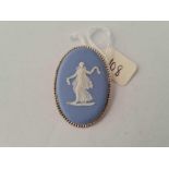 A oval silver mounted blue Wedgwood plaque brooch