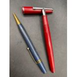 A crimson platignum fountain pen together with a propelling pencil
