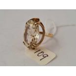 A large attractive pale smokey quartz oval stone ring set in fancy gold mount 9ct gold size K 6.6