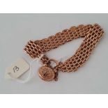 A ROSE GOLD BRACELET WITH FANCY CLASP 31 GMS