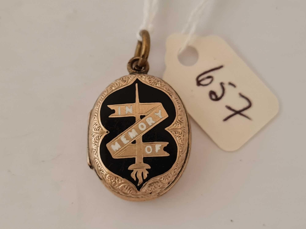 A gold back and front enamel mourning locket