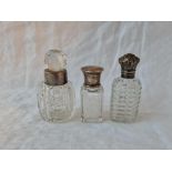 Scent bottle with embossed cover and cut glass body and two others