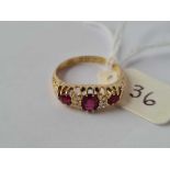 A EDWARDIAN GOLD RUBY AND DIAMOND SEVEN STONE RING CHESTER 1907 18CT GOLD SIZE L