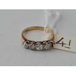 A 5 stone diamond ring (1 stone out) in 18ct gold 2.6g inc