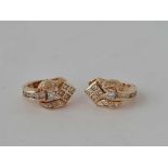 An attractive pair of diamond earrings in 14ct gold 4.1g