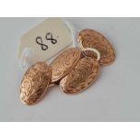 A pair of fancy oval cufflinks 9ct 5.5 gms