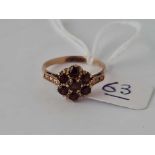 A vintage garnet cluster ring in 9ct size O