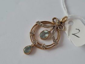 A pretty aquamarine and diamond pendant 3 gms