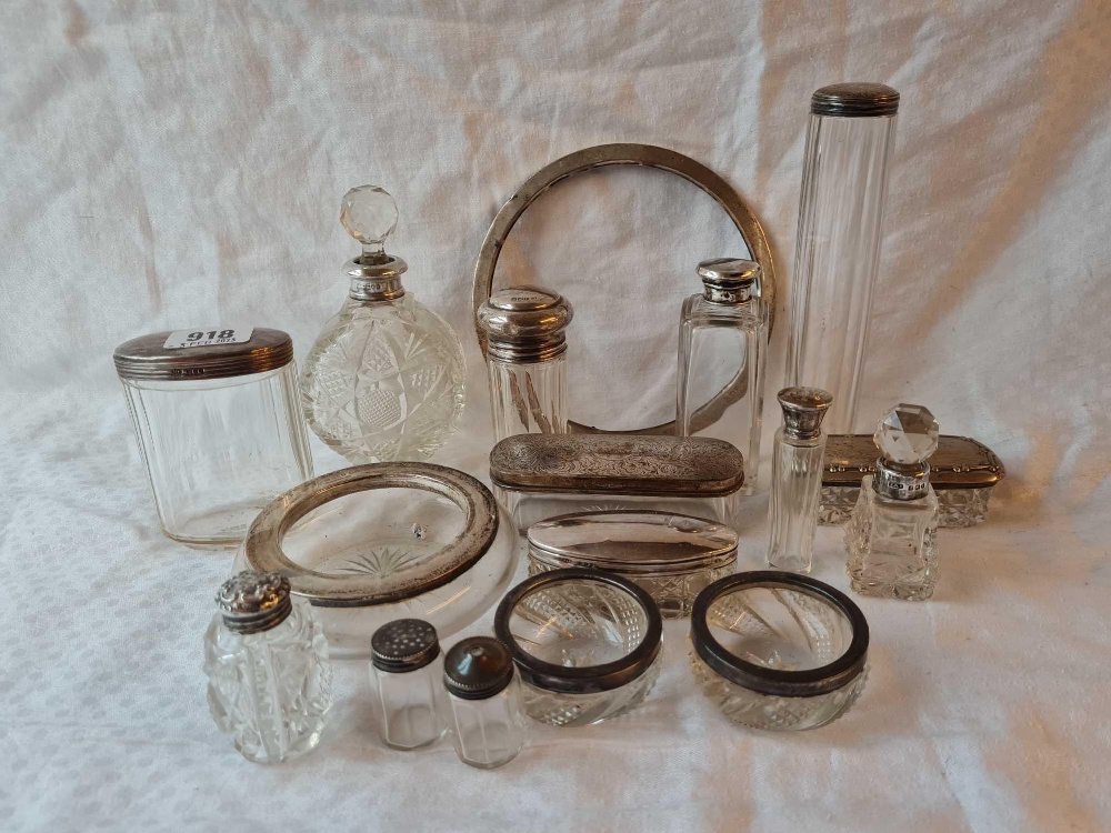 A box containing various scent bottles, jars, salts etc with glass bodies