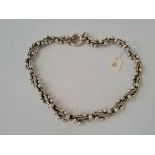A heavy fancy silver necklace 113 gms