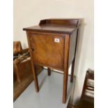 A mahogany tray top bedside cupboard