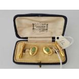 A EDWARDIAN GOLD AND JADE SET CUFFLINKS IN HARRODS BOX