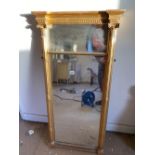 A Regency Period gilt framed mirror with Corinthian Capitals to the sides, 42" high