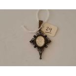 Antique Victorian silver pendant set with a central carved mother of pearl, depicting a crusader