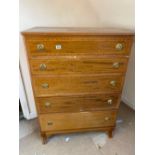 A small mahogany chest of four long drawers, splay feet, 3" wide