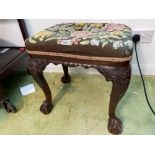 A George I style oak stool with carved cabriole legs and claw and ball feet