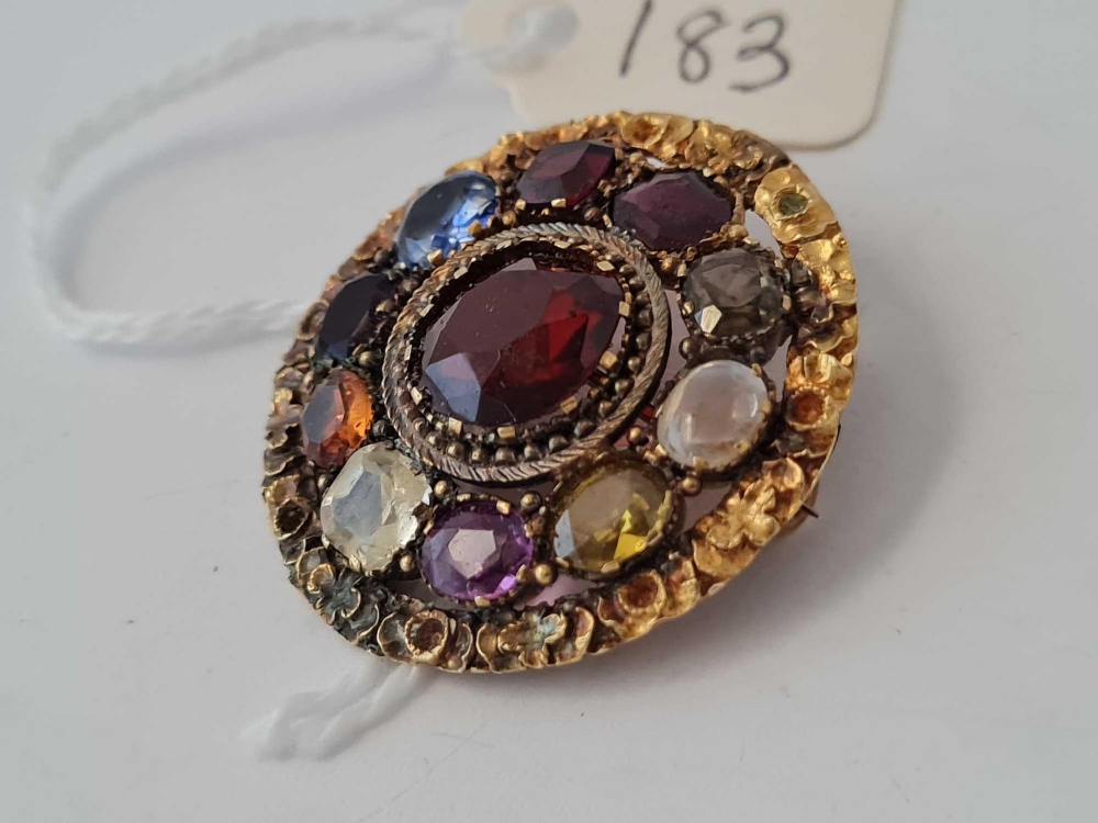 A antique circular brooch set with semi precious stones 9.4 gms - Image 2 of 3