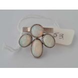 A LARGE VINTAGE WHITE GOLD RING SET WITH FOUR OPALS 18CT GOLD SIZE O 7.6 GMS