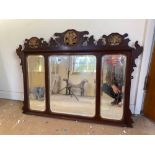 A Georgian style over mantle mirror with carved fret and gilt decoration, 39" wide