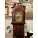 An Edwardian large chiming long case clock on tubes in an inlaid mahogany case, 8ft 6" high