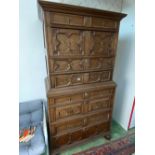 An Antique Jacobean style chest on chest with moulded boarders, bun feet, 40" wide